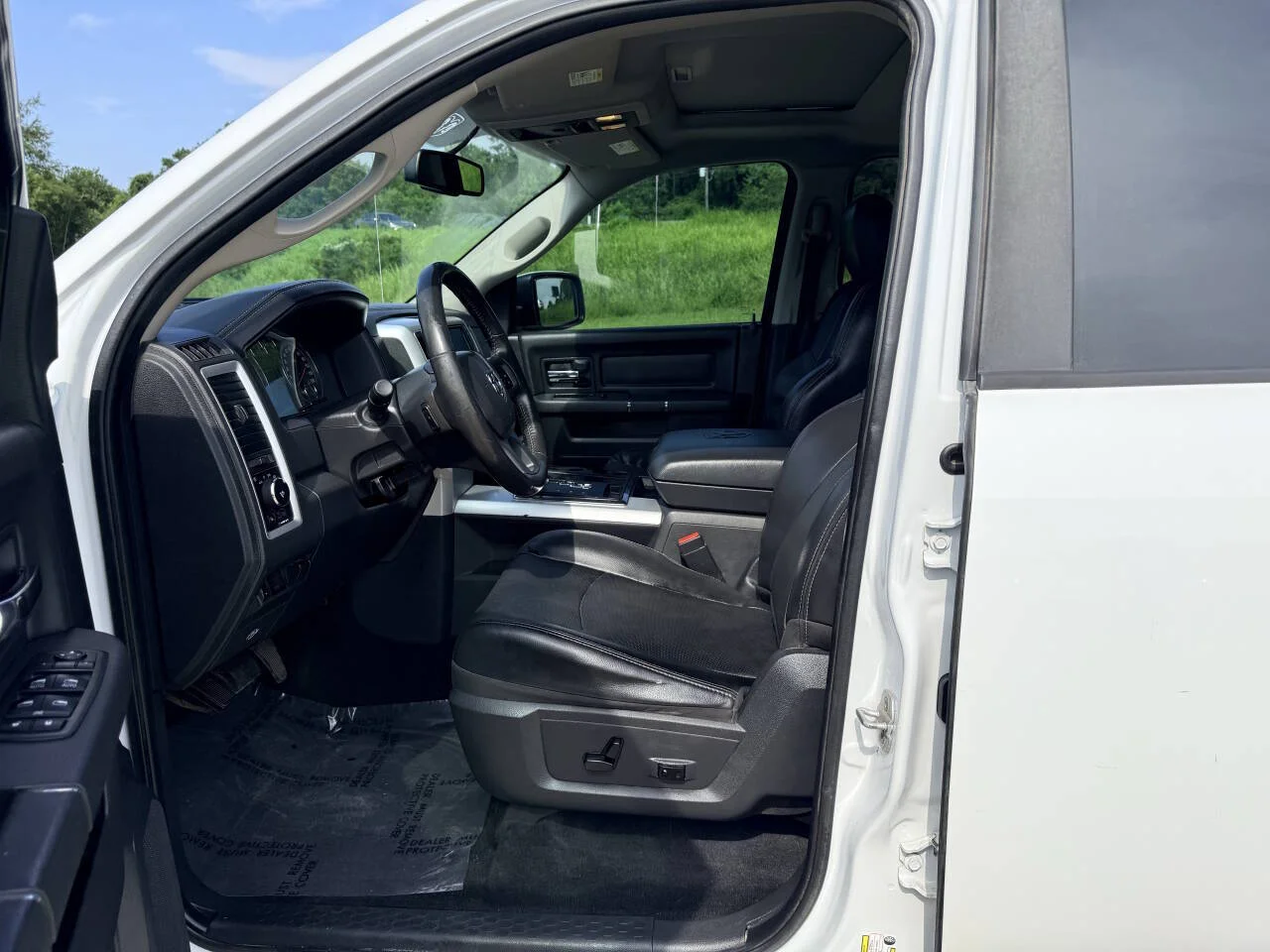 Used 2012 White RAM Sport 4x4 4dr Crew Cab 5.5 ft. SB Pickup image 16