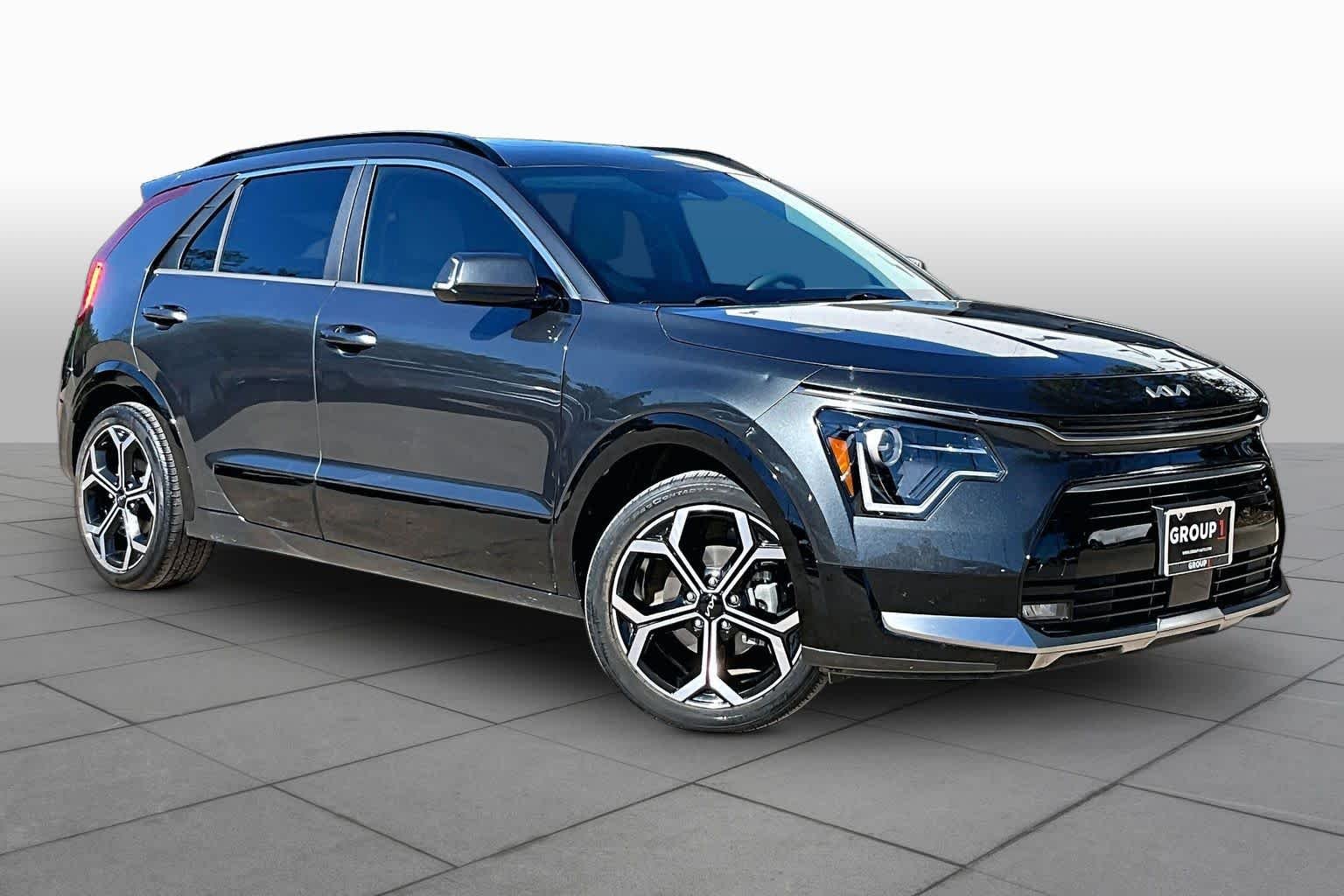 Used 2024 Graphite Gray Kia EX Touring image 3