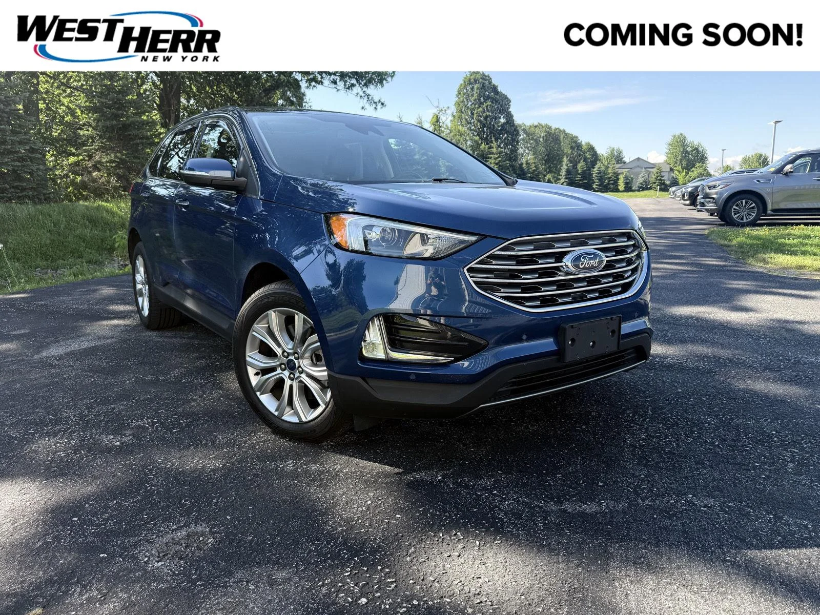 Used 2022 Atlas Blue Ford Titanium image 1