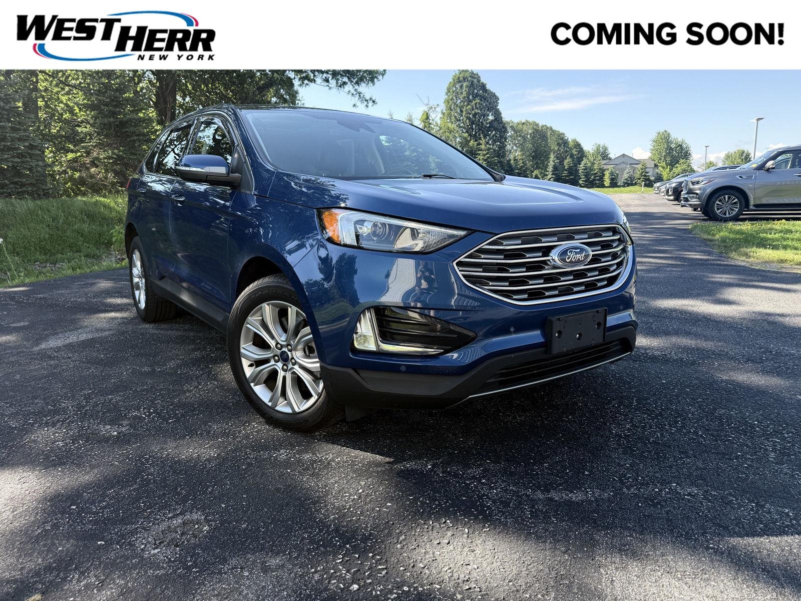 Used 2022 Atlas Blue Ford Titanium image 1