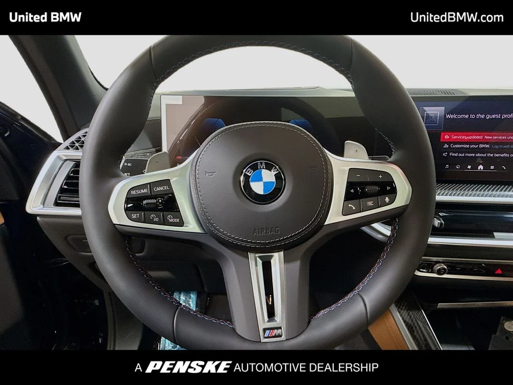 New 2026 Tanzanite Blue II Metallic BMW M60i image 6