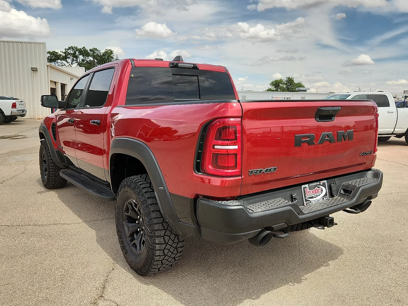 New 2026 Molten Red Pearl-Coat  Paint Ram RHO CREW CAB 4X4 5