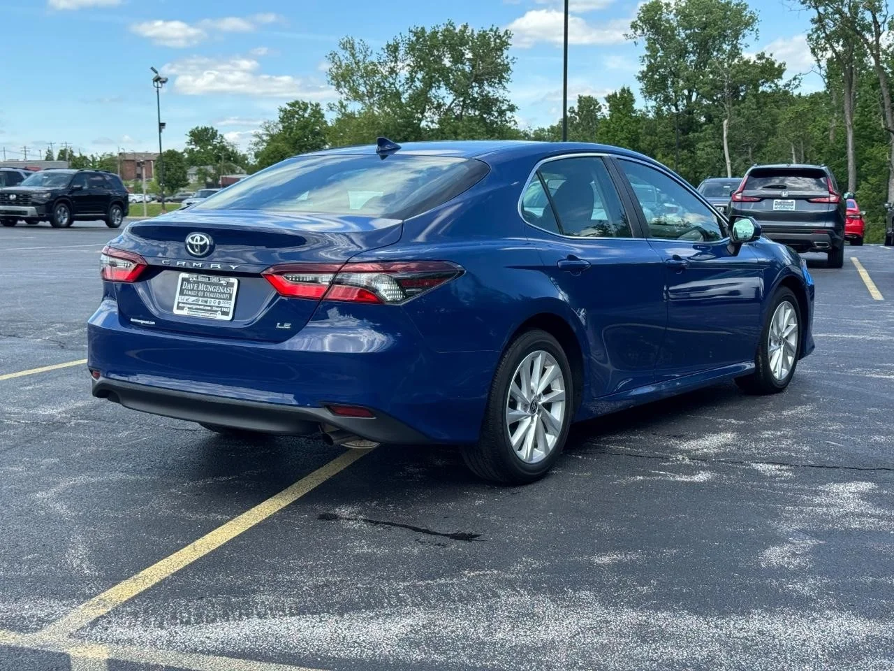 Used 2024 Reservoir Blue Toyota LE image 4