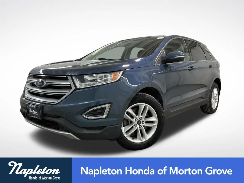 Used 2016 Blue Metallic Ford SEL image 1