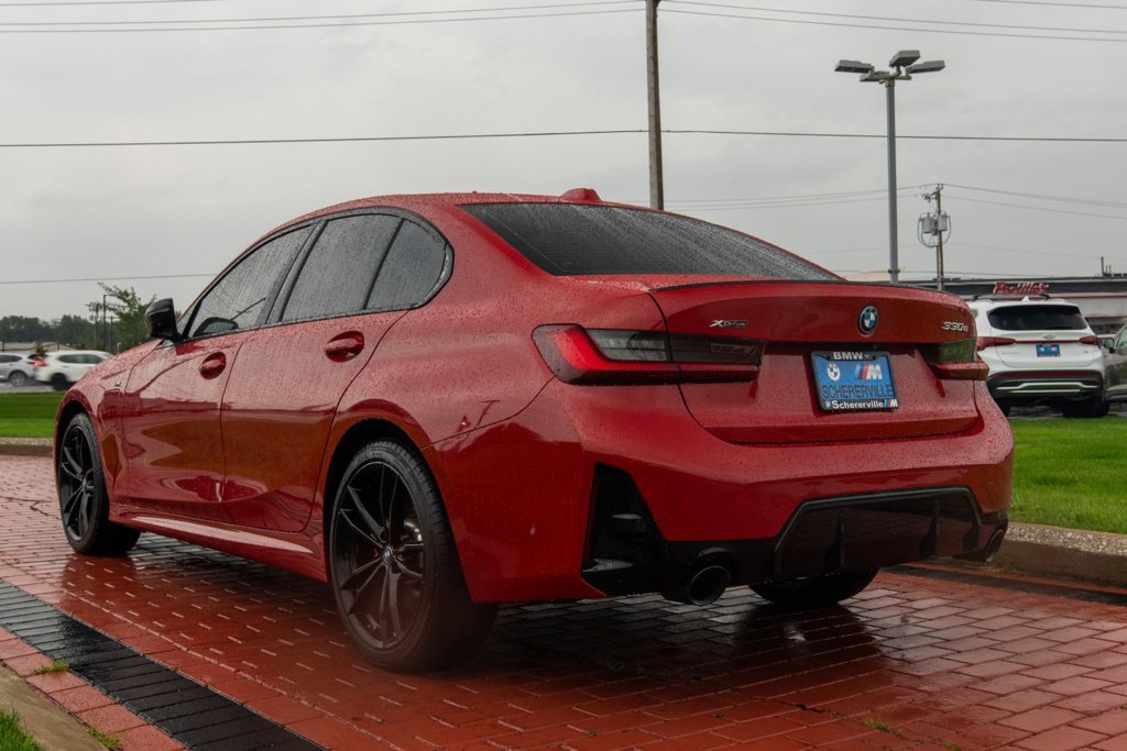 Used 2024 Melbourne Red Metallic BMW 330e xDrive image 4