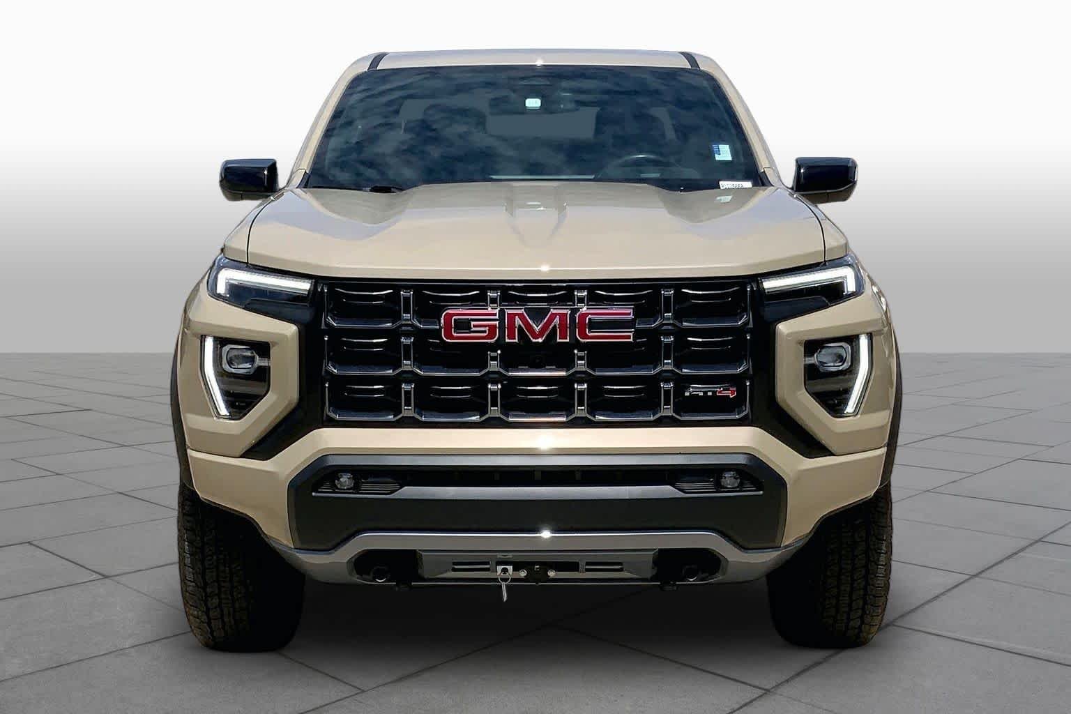 Used 2024 Desert Sand Metallic GMC 4WD AT4 image 4
