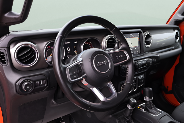 Used 2020 Orange Jeep Unlimited Sahara image 20