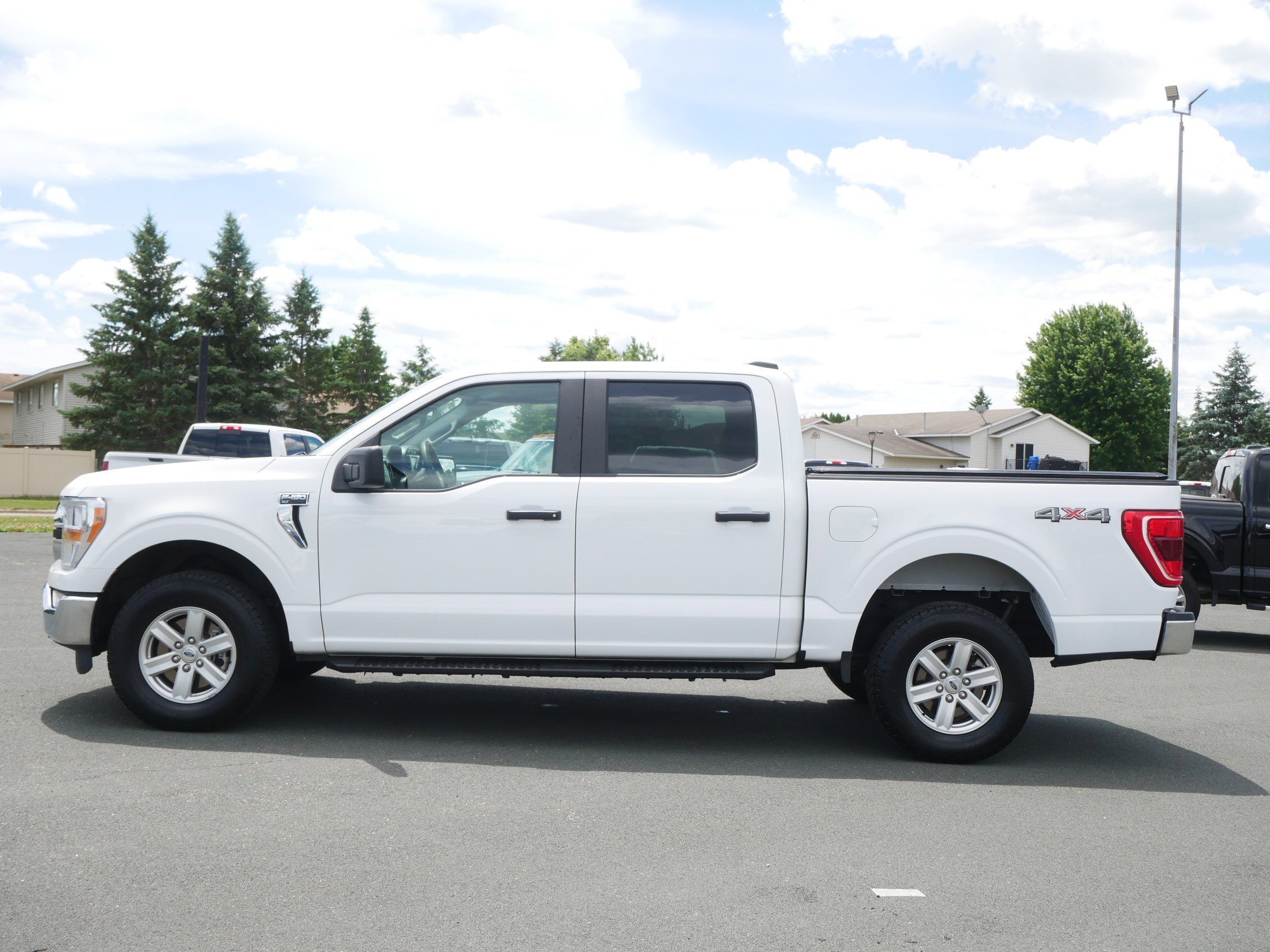 Used 2022 Ford F-150 XLT with VIN 1FTFW1E55NFB08895 for sale in Northfield, Minnesota