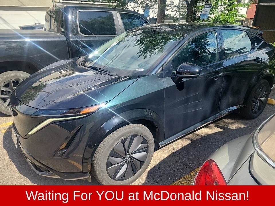 Used 2024 Green Nissan EVOLVE+ e-4ORCE image 1
