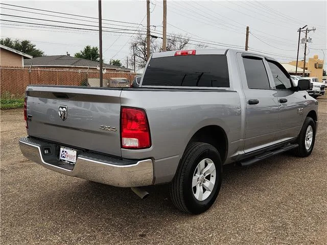 Used 2022 Billet Silver Metallic Clearcoat RAM SLT 4x4 Crew Cab 5.6 ft. box 140 in. WB image 3