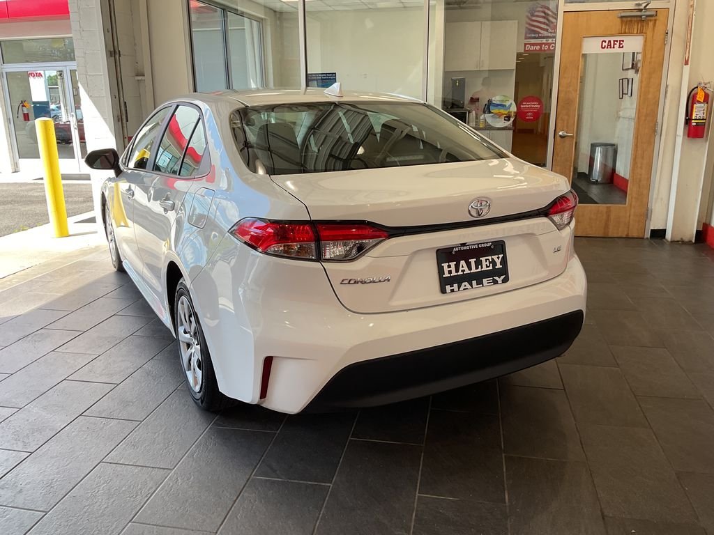 Used 2025 White Toyota LE image 6