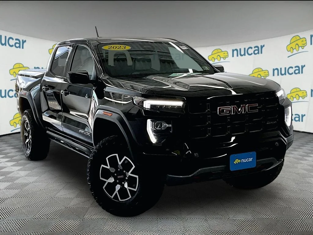Used 2023 Onyx Black GMC AT4X image 1