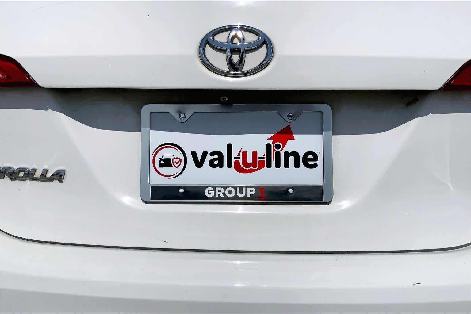 Used 2015 Super White Toyota LE image 10