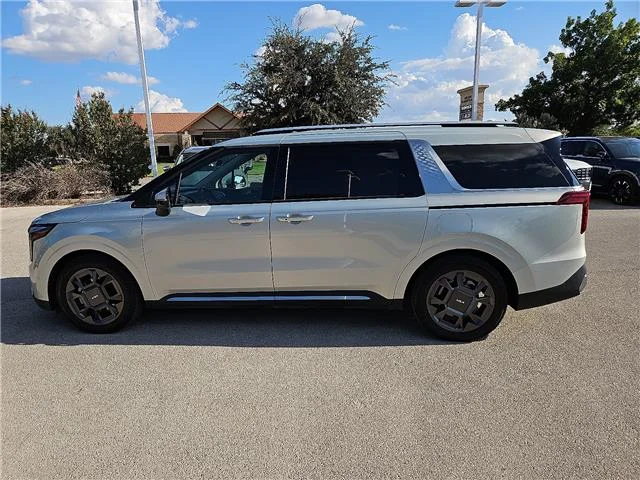 Used 2025 Ivory Silver KIA SX Passenger image 2