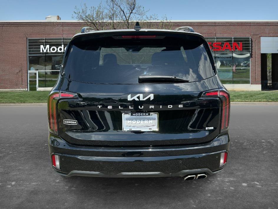 Used 2024 Ebony Black Kia SX Prestige X-Line image 3