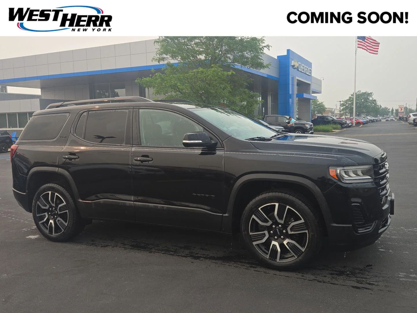 Used 2021 Ebony Twilight Metallic GMC SLE image 1