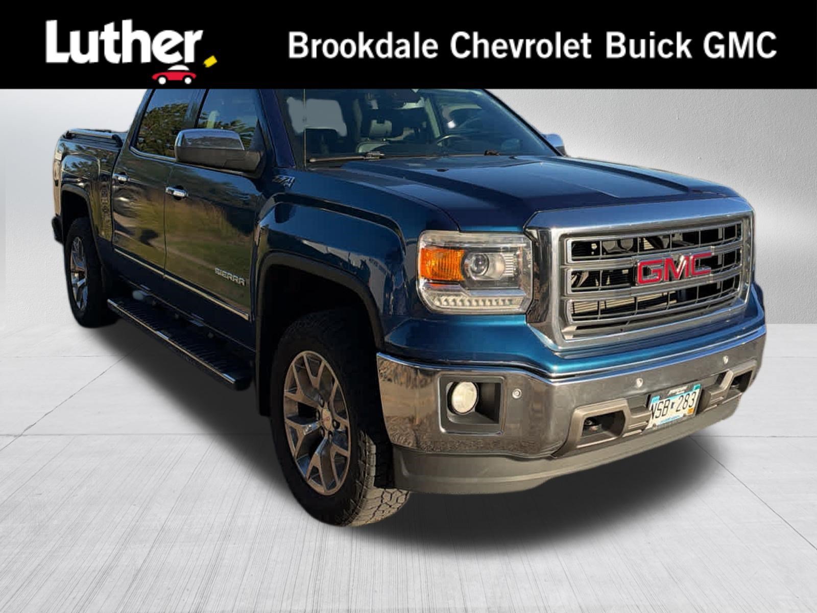 Used 2015 STONE BLUE METALLIC GMC SLT image 1