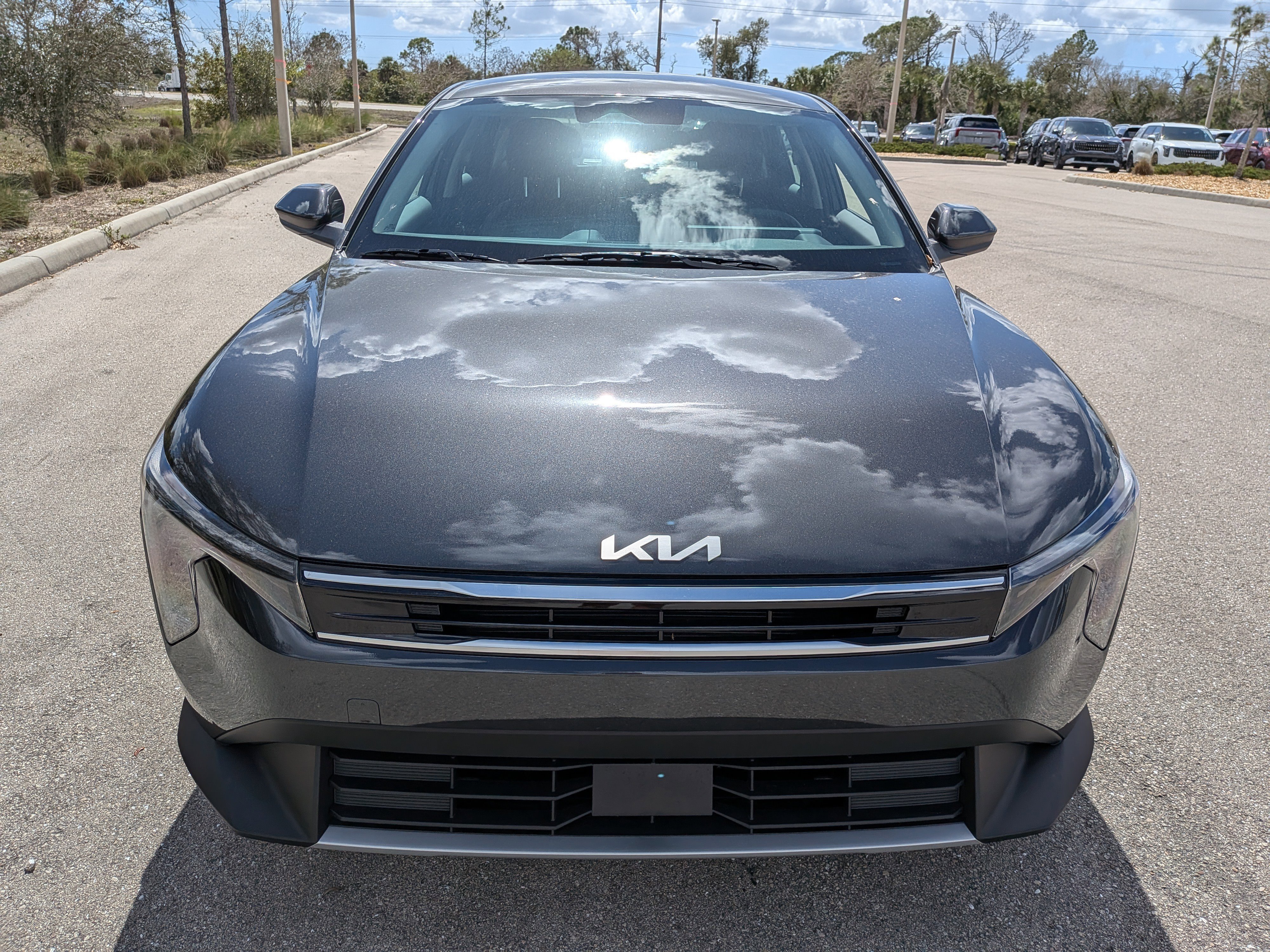 New 2026 Interstellar Gray Kia EX image 3