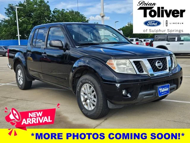 Used 2015 Super Black Nissan SV image 1