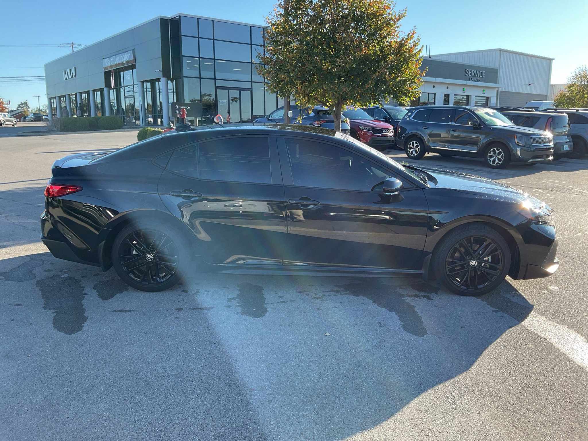 Used 2025 Midnight Black Metallic Toyota SE image 10