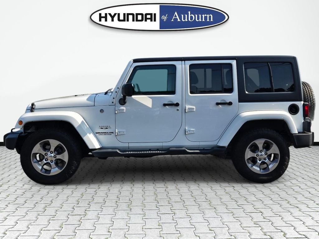 Used 2016 White Jeep Sahara image 11