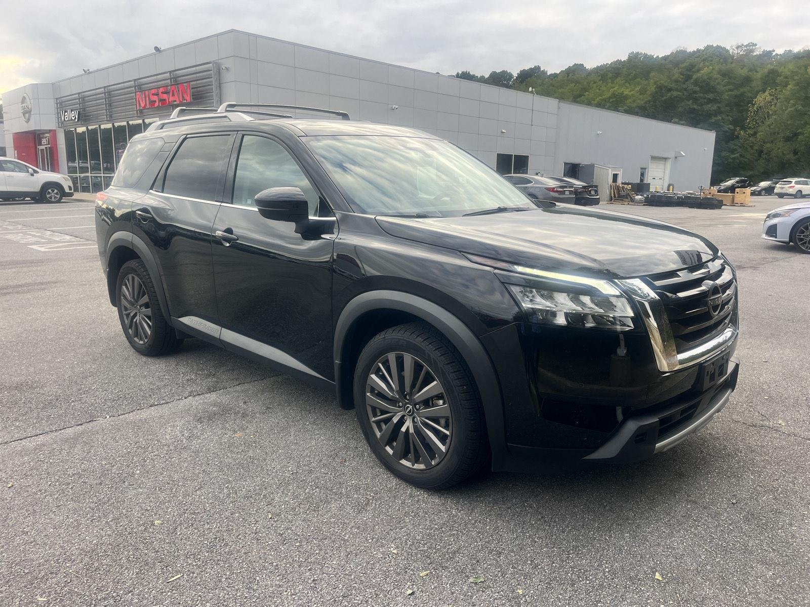 Used 2024 Super Black Nissan SL image 1