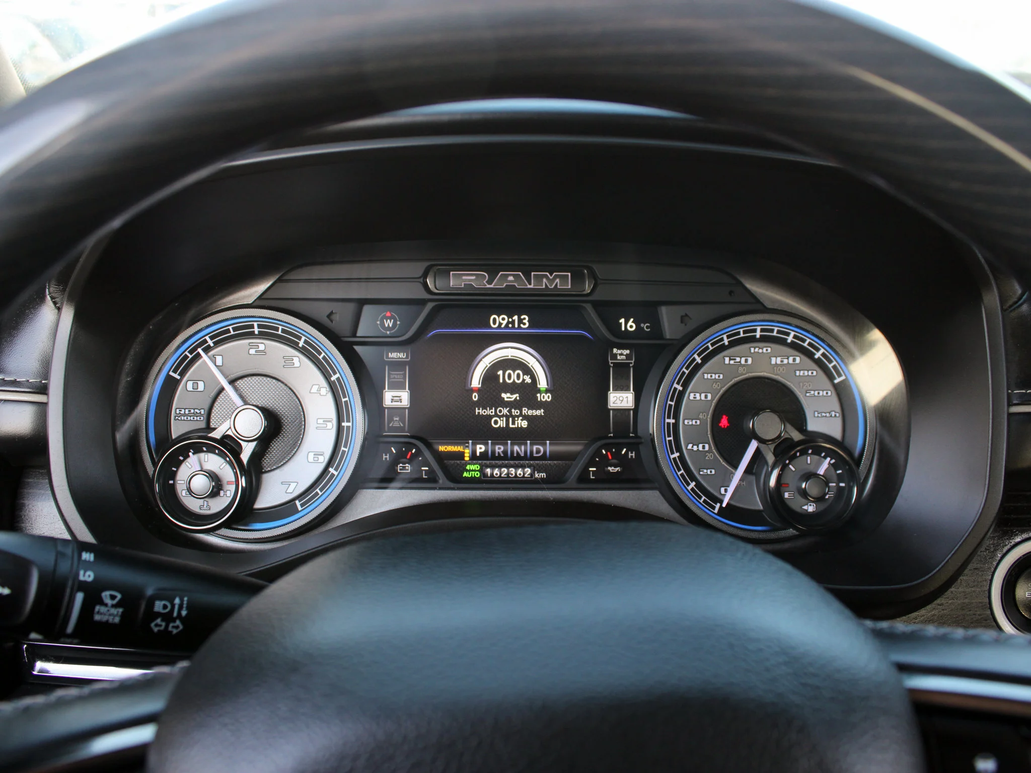 Used 2022 Grey RAM Limited * No Accidents | HEMI V8 | LOADED | ENVY Wheels | Head-Up Display | Night Edition image 7