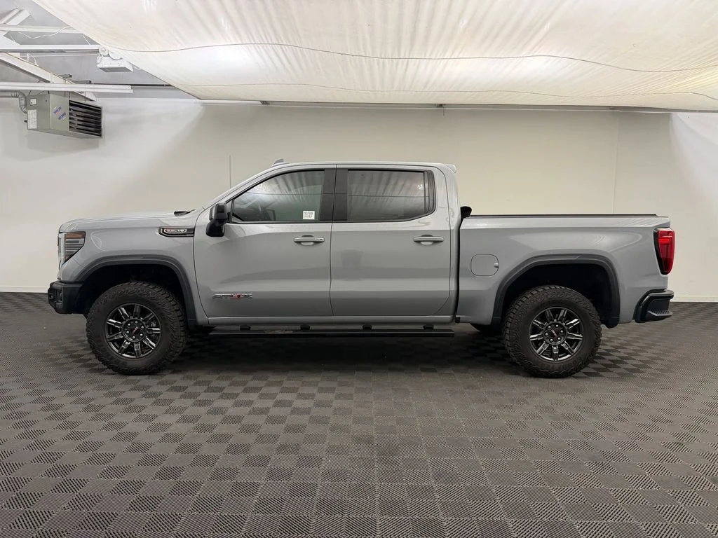 Used 2025 Thunderstorm Gray GMC AT4X image 2