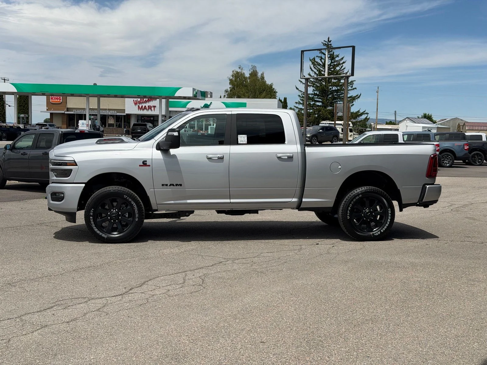 New 2026 Silver-Zynith Exterior Paint RAM Laramie image 11