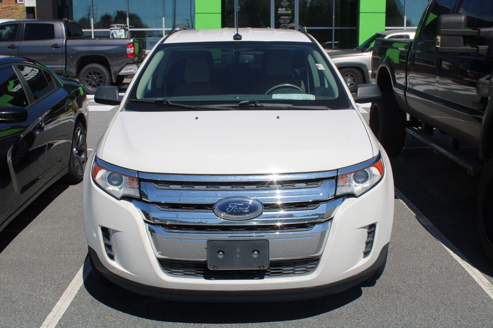 Used 2012 White Suede Ford SE image 2