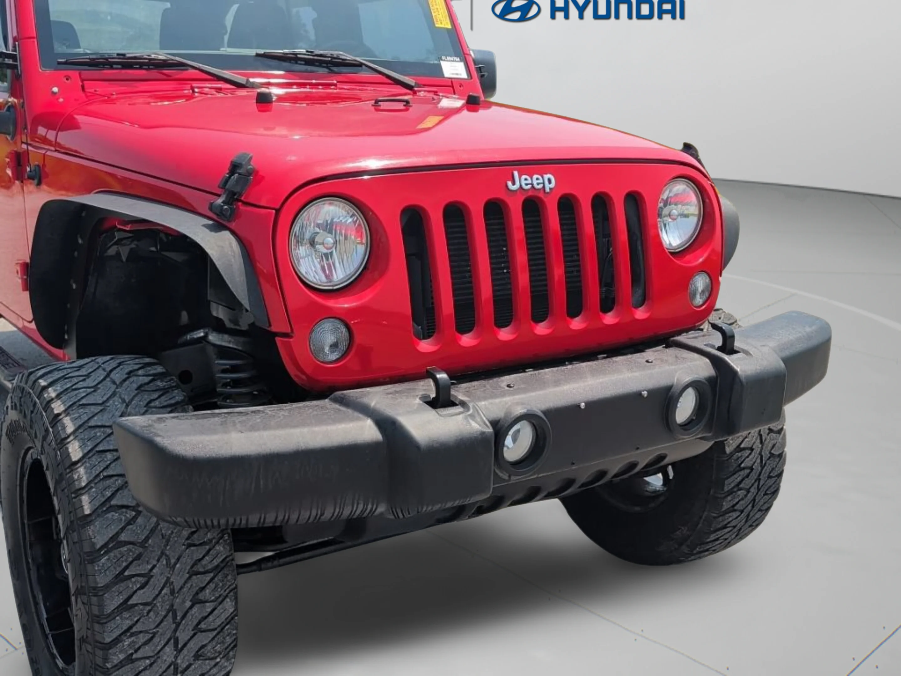 Used 2015 Firecracker Red Clear Coat Jeep Sport image 33