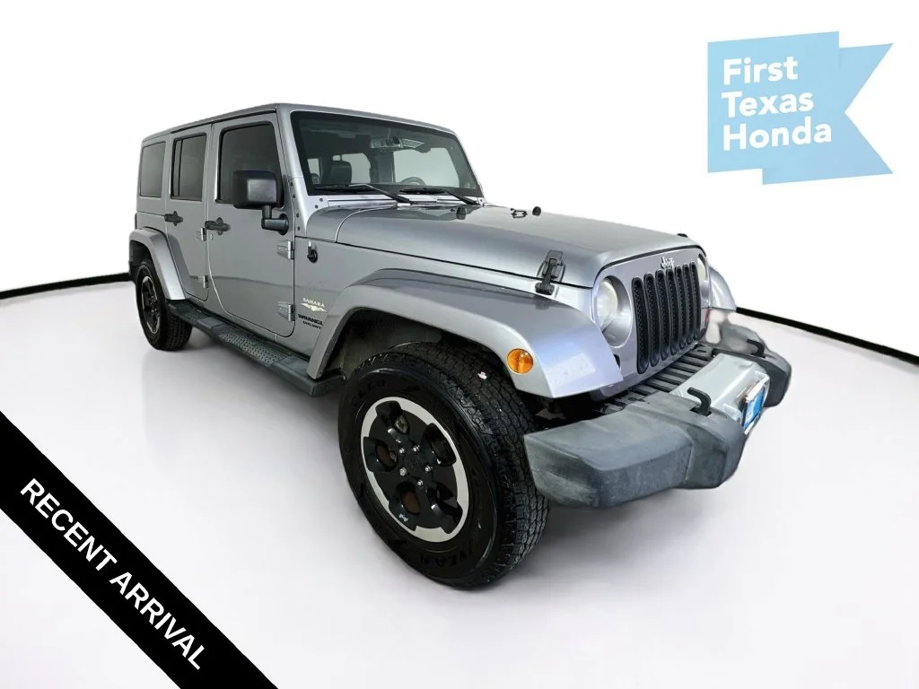 Used 2013 Billet Metallic Clearcoat Jeep Unlimited Sahara image 1