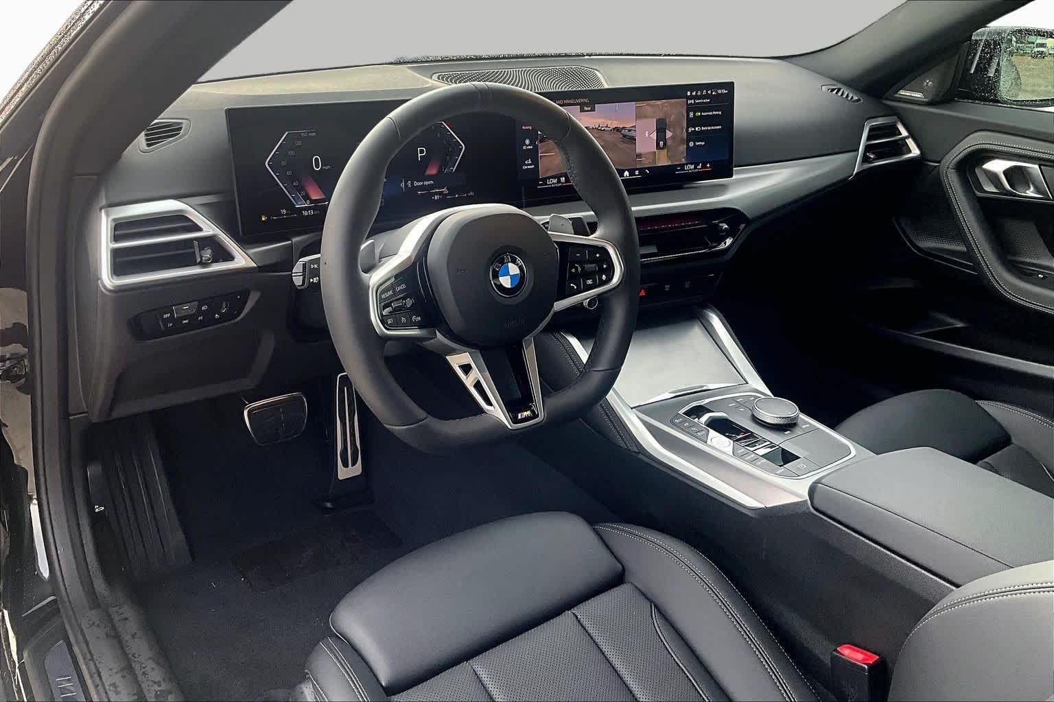 Used 2025 Black Sapphire Metallic BMW 230i xDrive image 16
