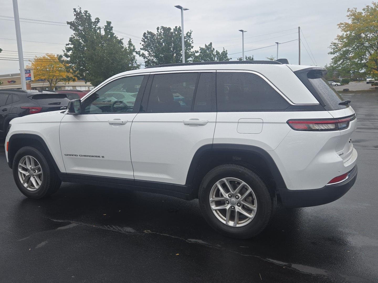 Used 2024 Bright White Clearcoat Jeep Laredo X image 4