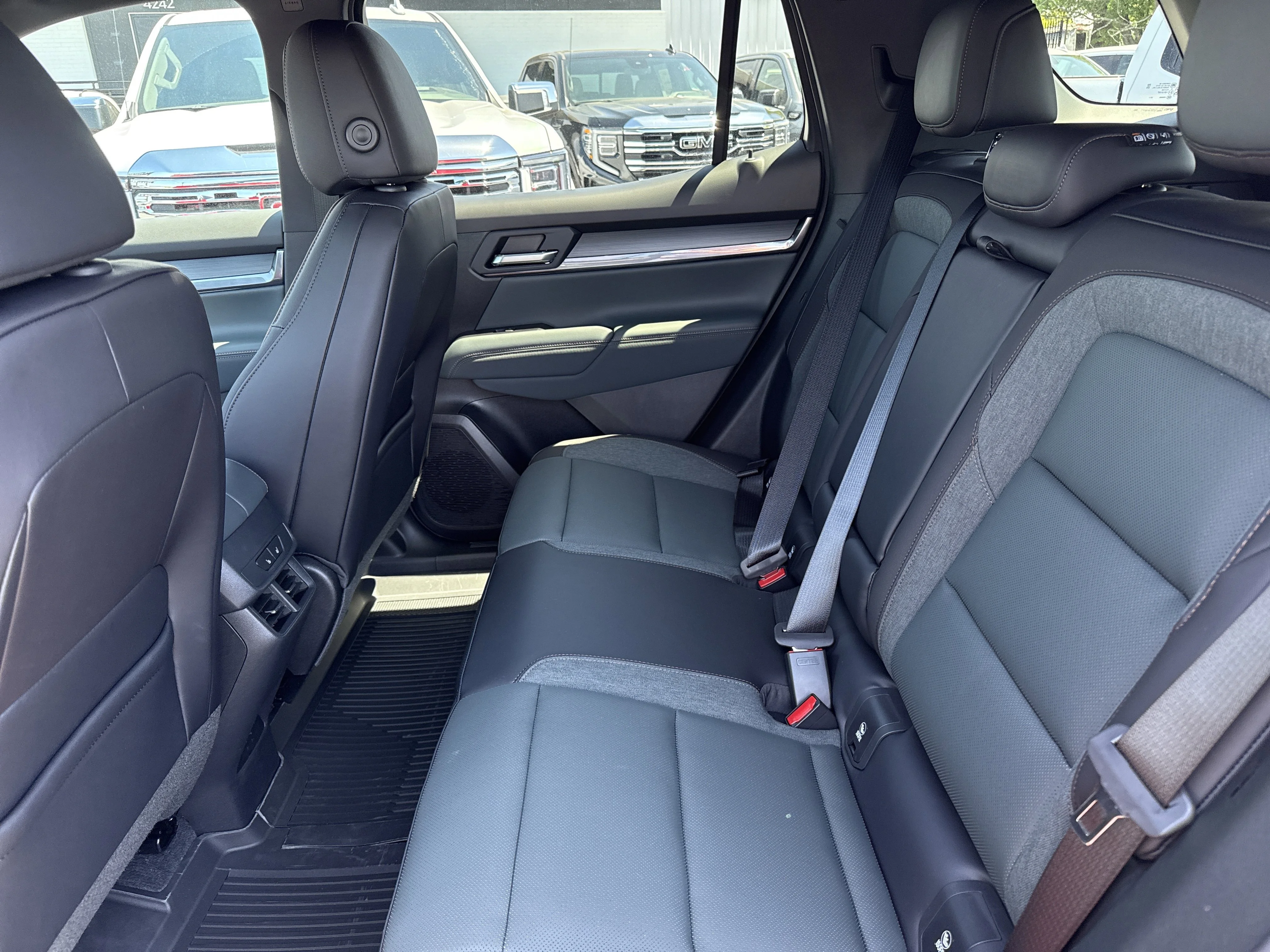 New 2026 Volcanic Red Tintcoat GMC AWD AT4 image 6