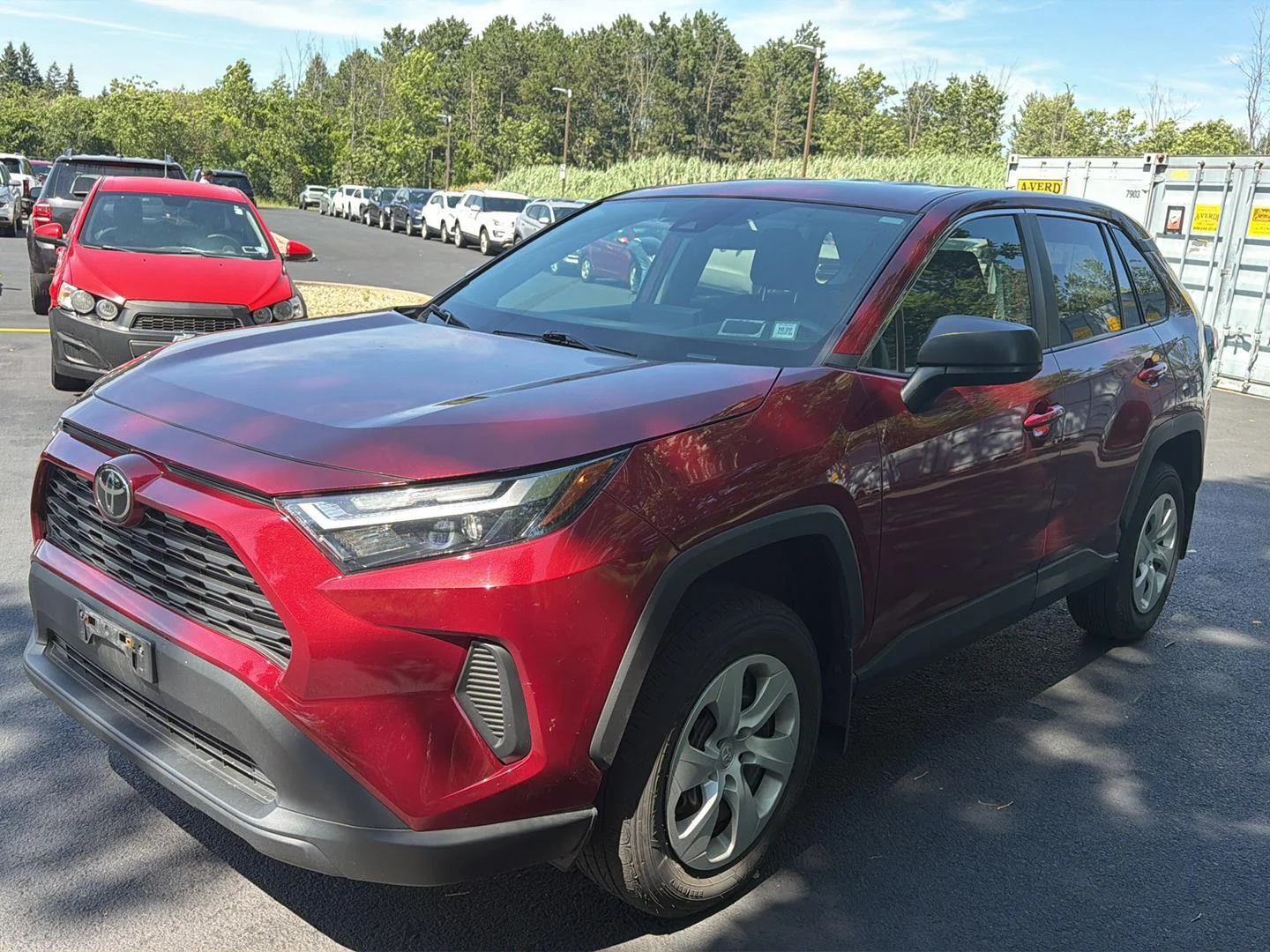 Used 2023 Ruby Flare Pearl Toyota LE image 3