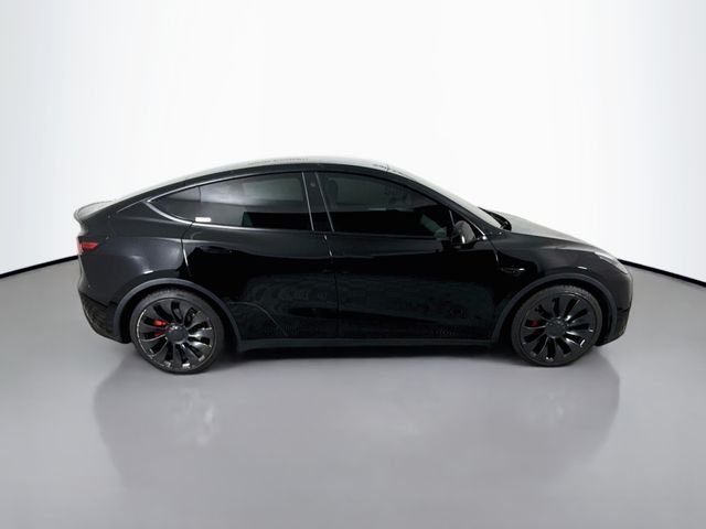 Used 2023 Solid Black Tesla Performance image 8