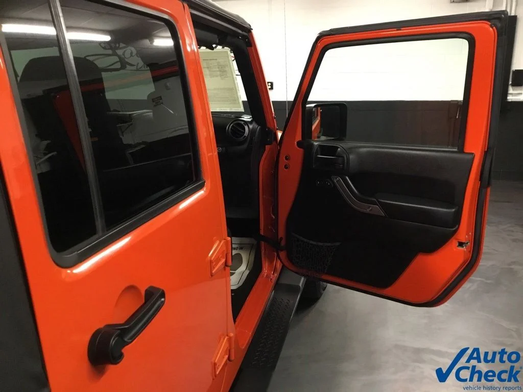 Used 2015 Orange Jeep Unlimited Sport image 41