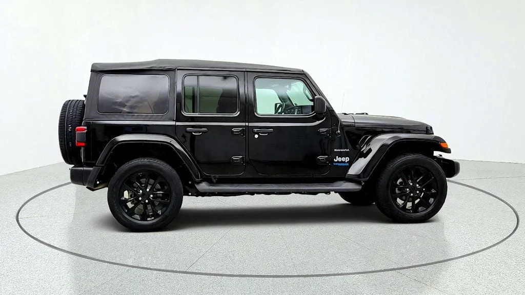 Used 2021 Black Clearcoat Jeep Unlimited Sahara 4xe w/ Cold Weather Group & Keyless Entry image 4