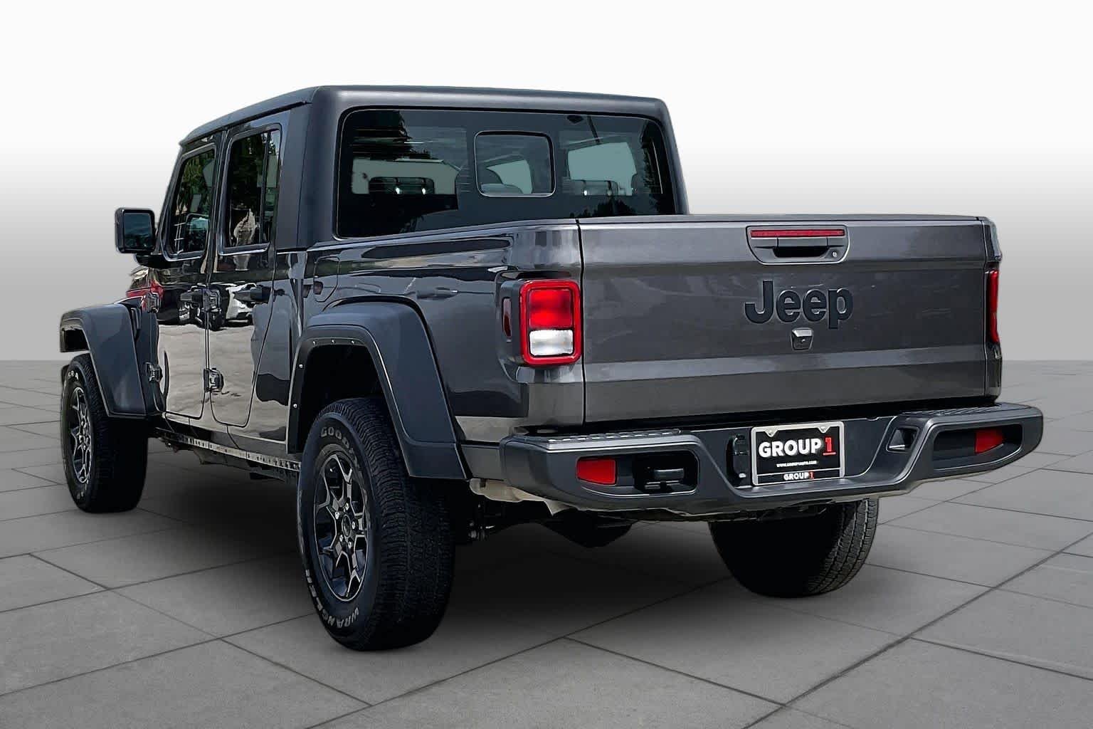 Used 2023 Granite Crystal Metallic Clearcoat Jeep Sport image 12