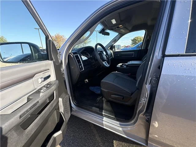 Used 2024 Granite Crystal Metallic Clearcoat RAM SLT 4x4 Quad Cab 6.3 ft. box 140 in. WB image 10