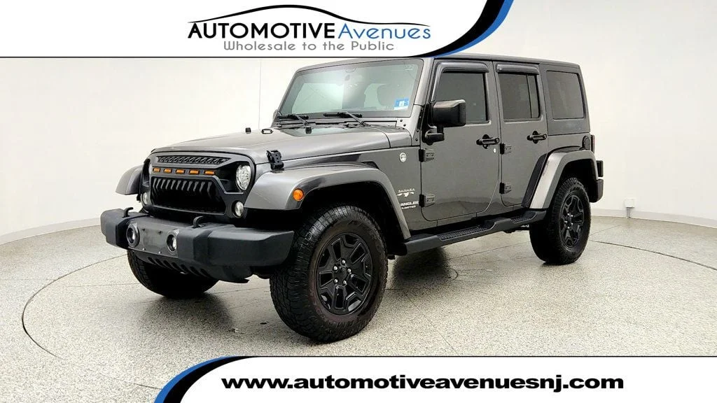 Used 2017 Granite Crystal Metallic Clearcoat Jeep Sahara 4x4 w/ Heated Seats, Remote Start & Connectivity Pkg image 1