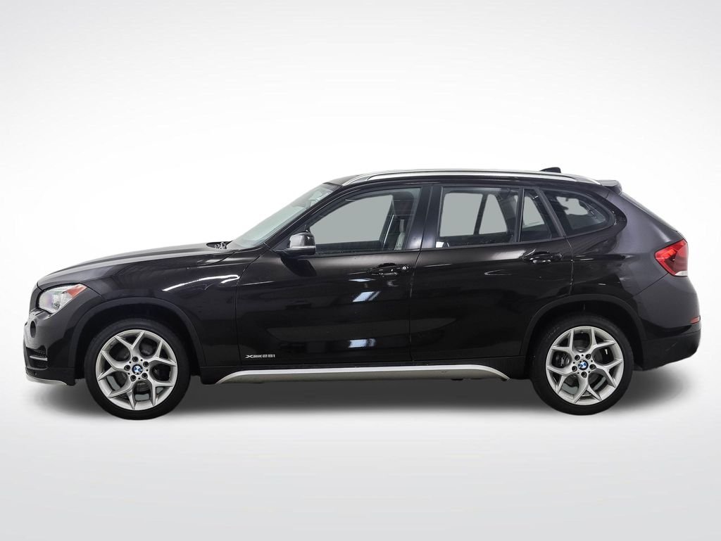 Used 2015 BMW X1 28i with VIN WBAVL1C59FVY33170 for sale in Minneapolis, Minnesota
