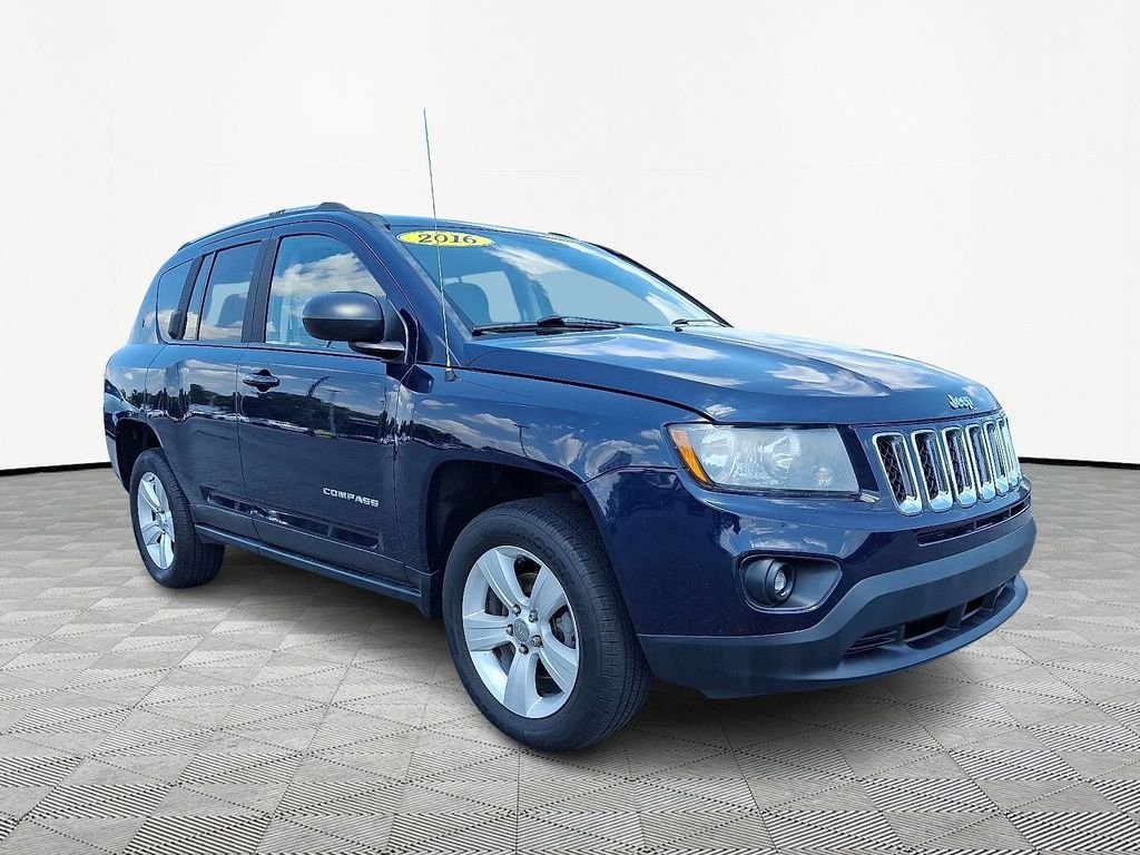 Used 2016 Blue Jeep Sport image 1