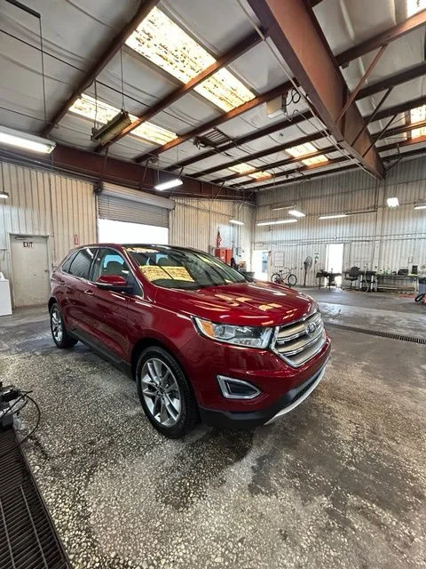 Used 2015 Red Ford Titanium image 1