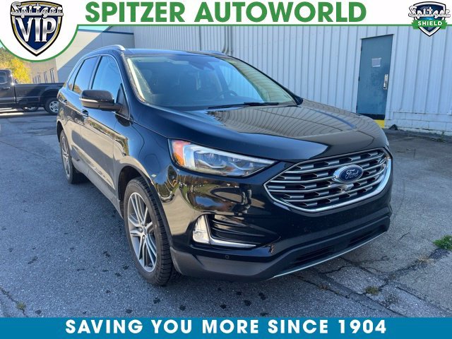 Used 2022 Black Ford Titanium image 1