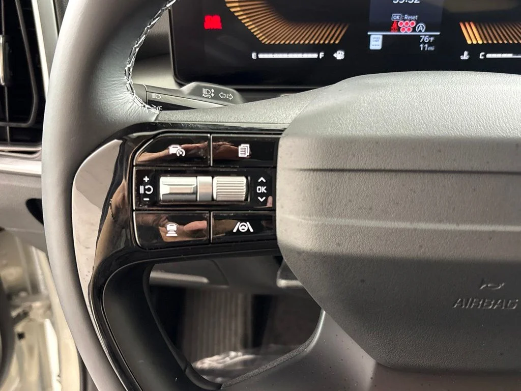 New 2026 Ivory Silver Kia LX image 30