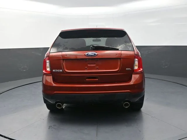 Used 2014 Orange Ford SEL image 7