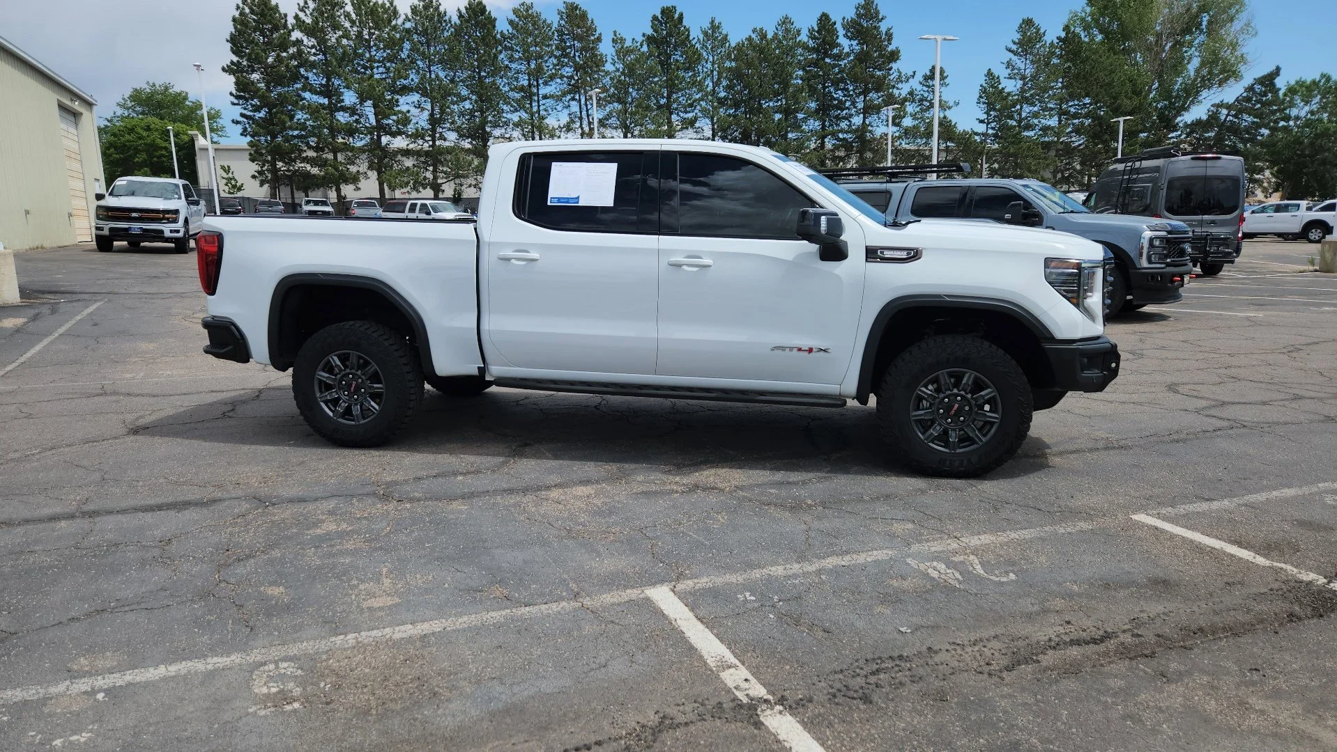 Used 2025 Summit White GMC AT4X image 12