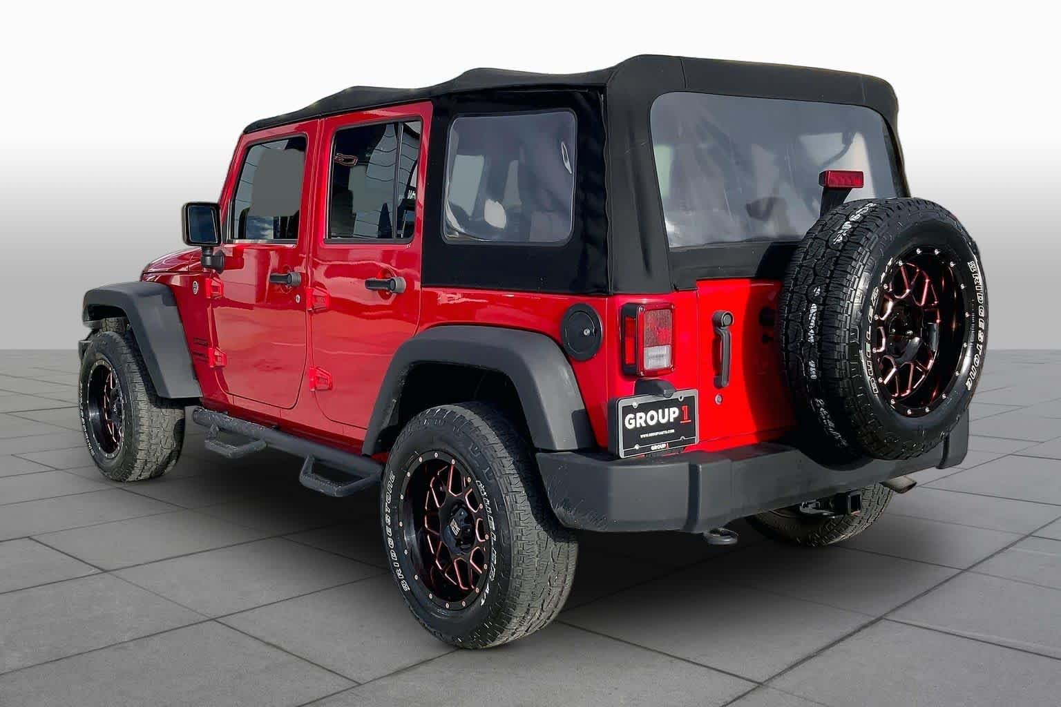 Used 2016 Firecracker Red Clearcoat Jeep Sport image 10